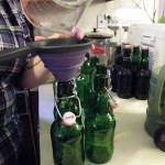 addingthebooch funneling in the kombucha